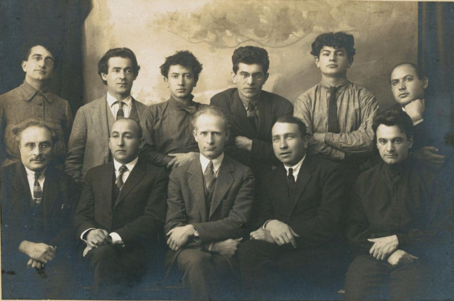 Jewish writers on the occasion of a visit by Yiddish writer H. Leivick (front row, center), Moscow, 1925. Among those in the portrait are Izi Kharik and Zelik Akselrod (back row, first and third from left), Yehezkl Dobrushin, Borekh Glazman (also visiting from New York), Shmuel-Nisn Godiner, and Arn Kushnirov (front row, first, second, fourth, and fifth from left). Photo by B. Kapustinskii. (YIVO)